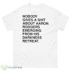 Nobody Gives A Shirt About Aaron Rodgers Emerging From His Darkness Retreat Shirt - 500 Men’s Classic Tee Gildan