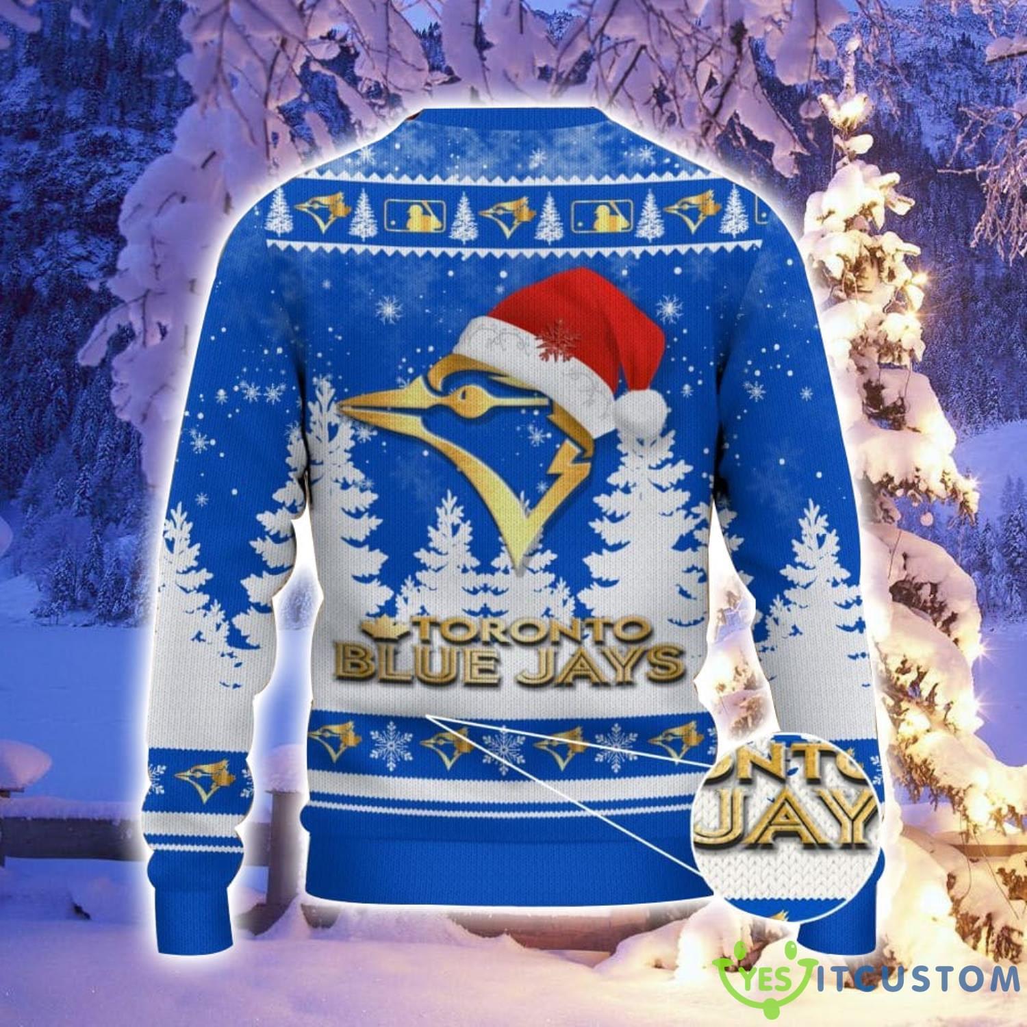 Toronto Blue Jays Logo Wearing Santa Hat Christmas Gift Ugly Christmas Sweater For Men And Women Gift 3 Toronto Blue Jays Logo Wearing Santa Hat Christmas Gift Ugly Christmas Sweater For Men And Women Gift Product Photo 3