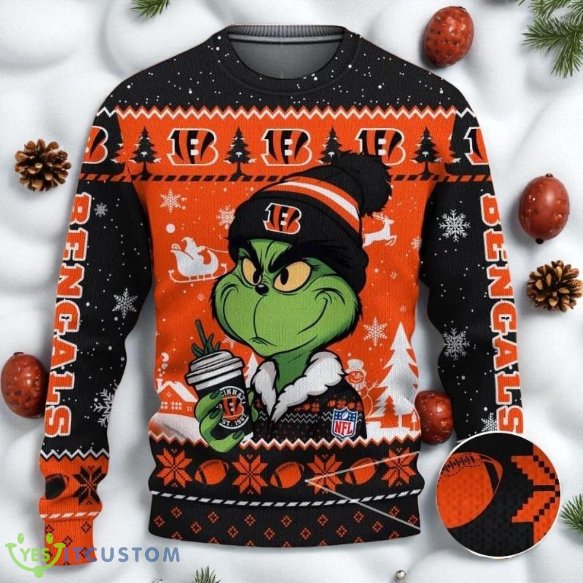 The Grinch Drink Coffee Cincinnati Bengals Ugly Christmas Sweater NFL Fans Sport Christmas Sweater 2 The Grinch Drink Coffee Cincinnati Bengals Ugly Christmas Sweater NFL Fans Sport Christmas Sweater Product Photo 1