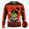 The Grinch Drink Coffee Cleveland Browns Ugly Christmas Sweater NFL Fans Sport Christmas Sweater Product Photo 1
